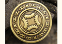 Grinder Half Dollar Coin (Bronze)